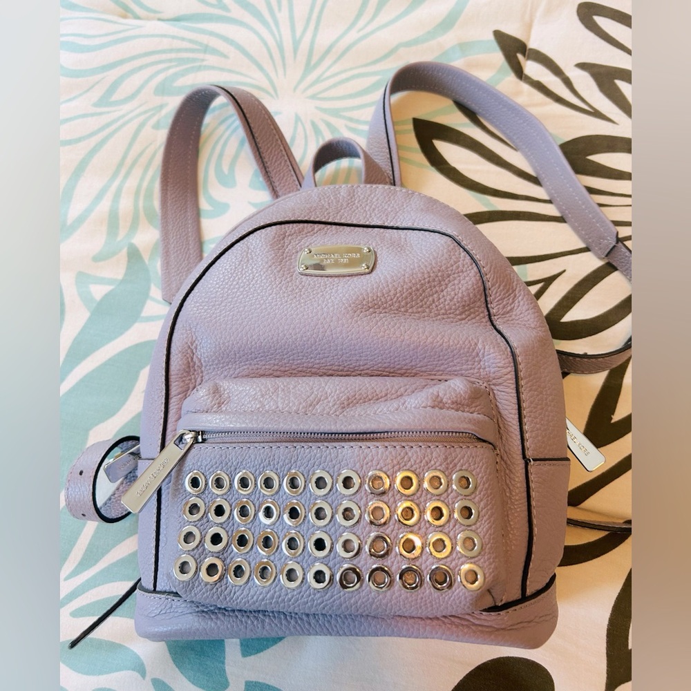 Michael Kors small purple backpack. Silver studded